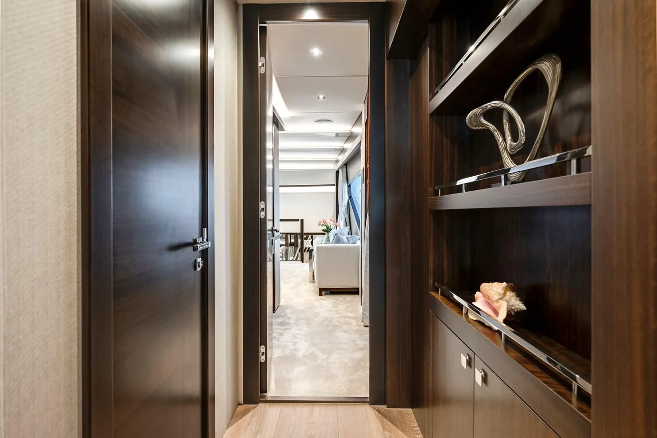 a room with a door and a mirror aboard TRIGGER HAPPY Yacht for Sale