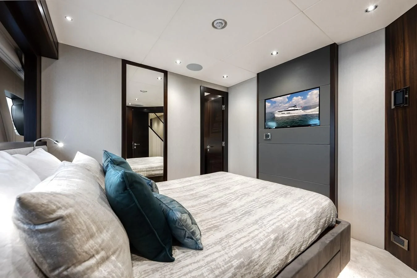 a bed in a room aboard TRIGGER HAPPY Yacht for Sale