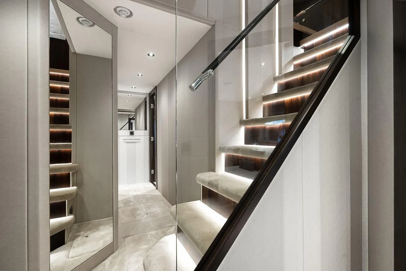 a hallway with white walls aboard TRIGGER HAPPY Yacht for Sale