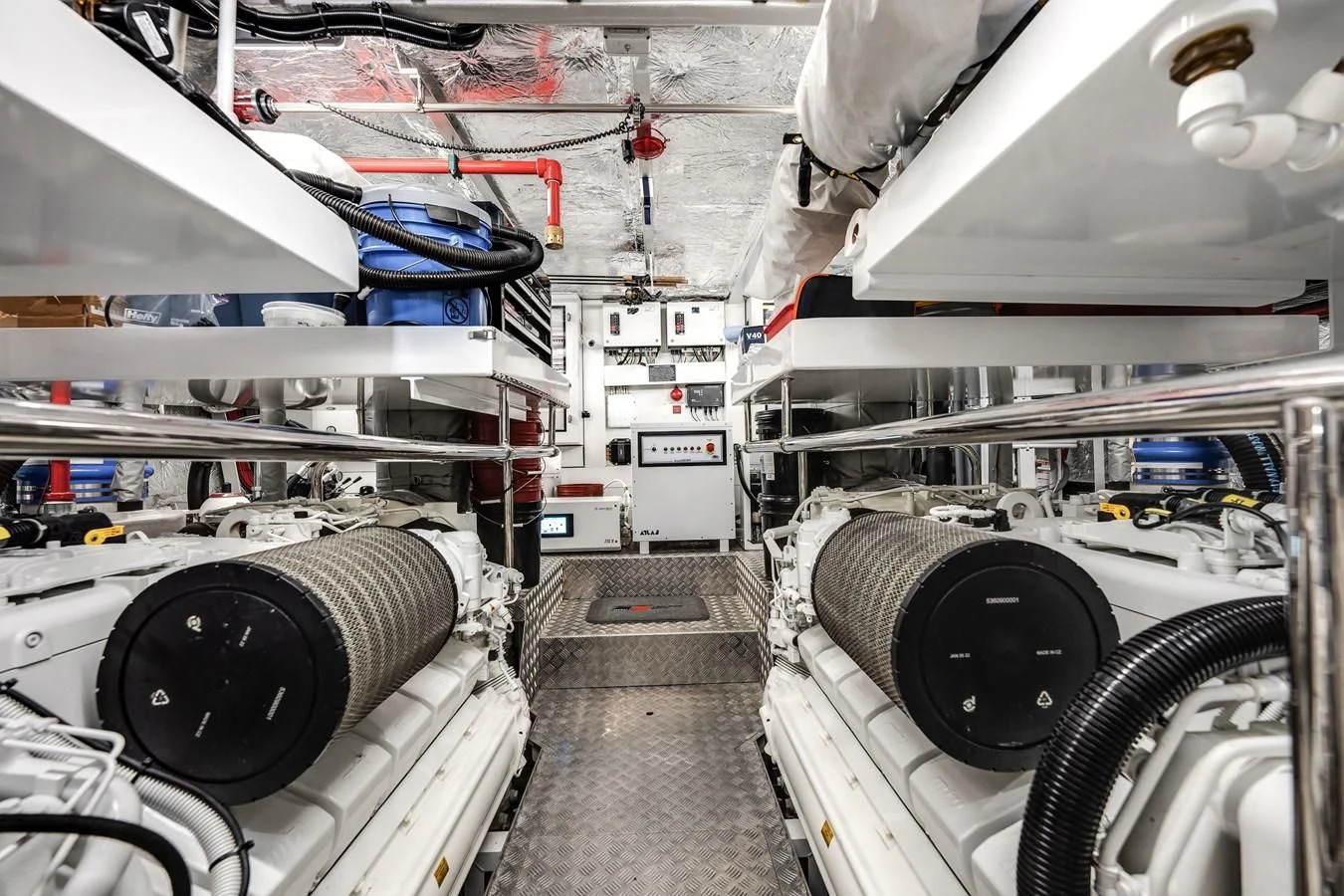 a room with white pipes aboard TRIGGER HAPPY Yacht for Sale