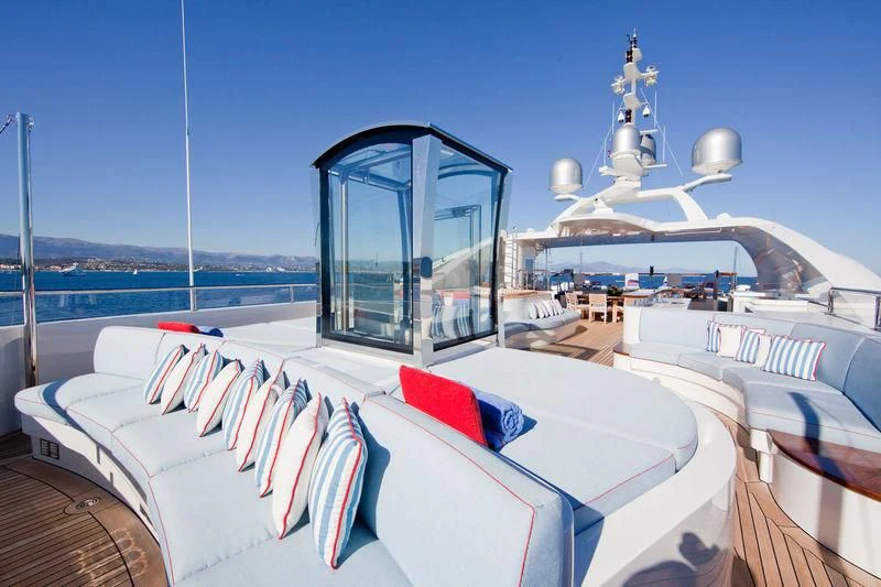 a large balcony overlooking a body of water aboard LADY BRAVE Yacht for Sale