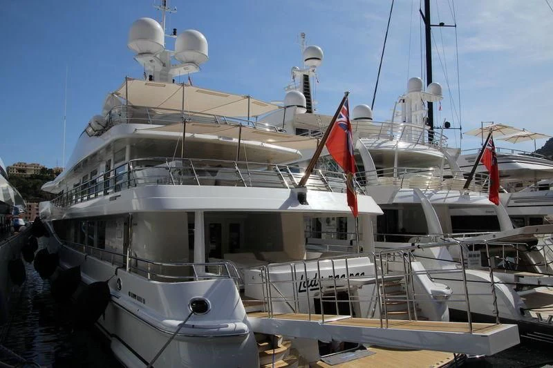a boat docked at a pier aboard LADY BRAVE Yacht for Sale