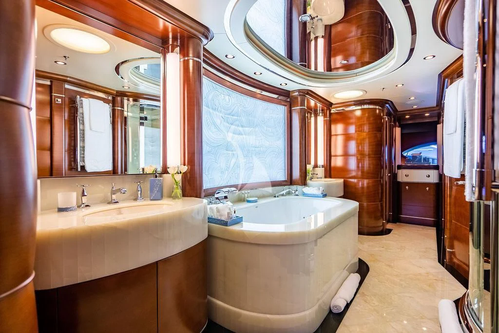 a bathroom with a large mirror aboard LADY BRAVE Yacht for Sale