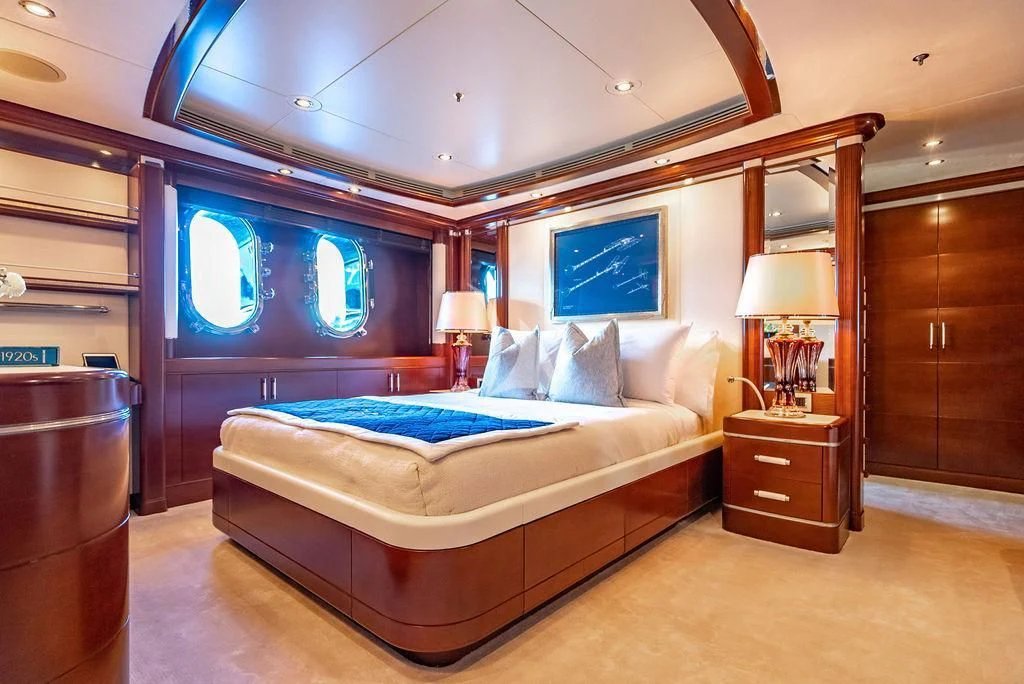 a bed in a room aboard LADY BRAVE Yacht for Sale