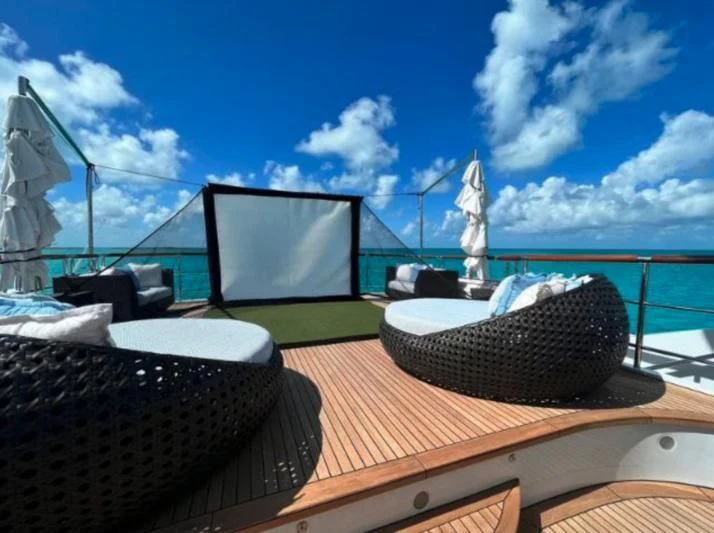 a computer on a table aboard LADY BRAVE Yacht for Sale