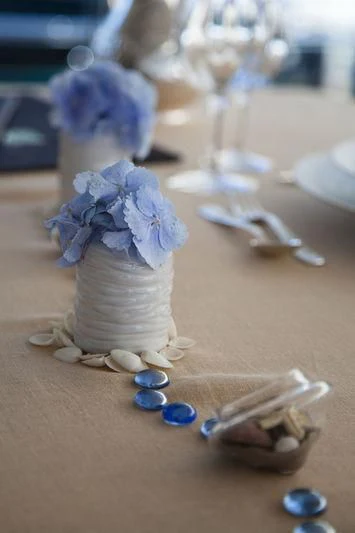a blue flower on a table aboard LADY BRAVE Yacht for Sale