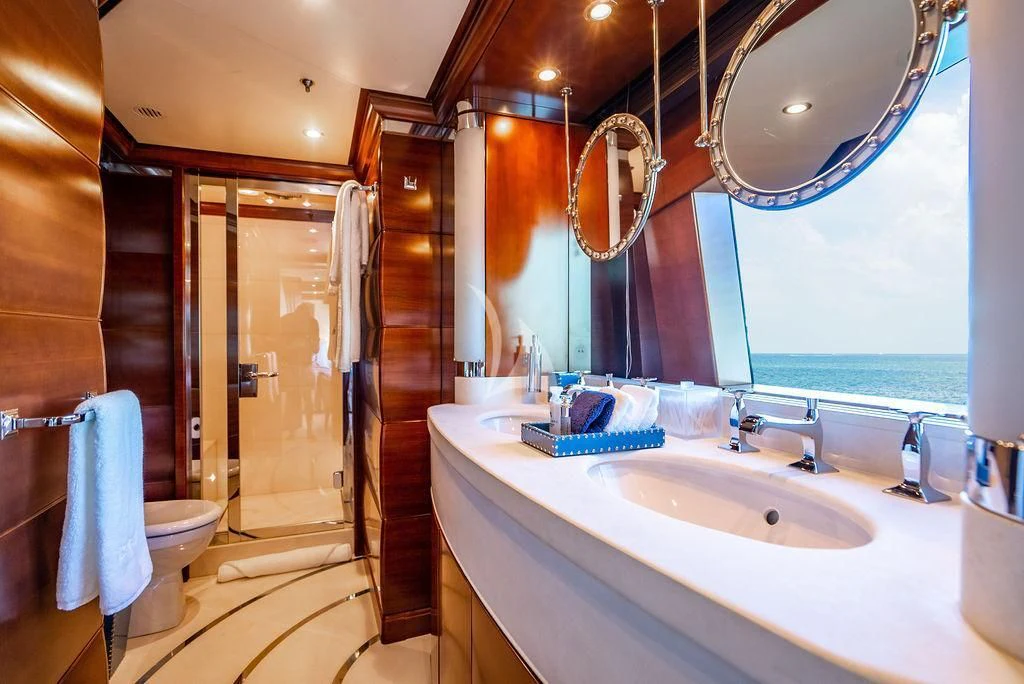 a bathroom with a sink and a shower aboard LADY BRAVE Yacht for Sale
