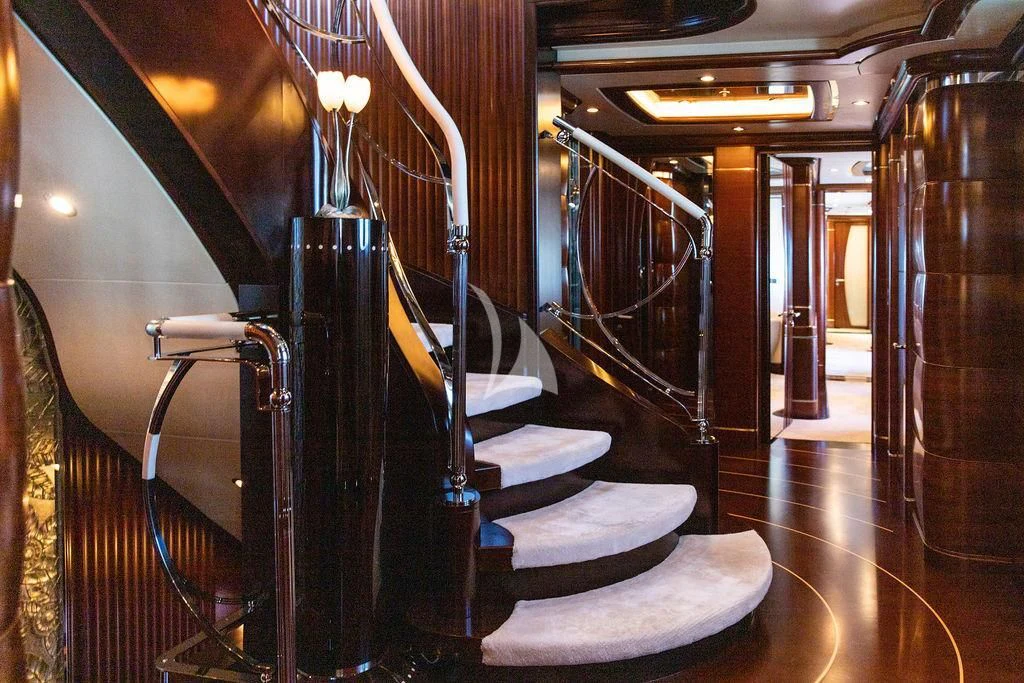 a room with a large staircase aboard LADY BRAVE Yacht for Sale