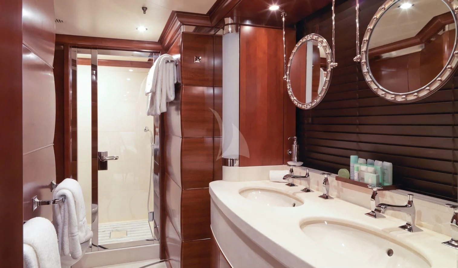 a bathroom with a sink and a shower aboard LADY BRAVE Yacht for Sale