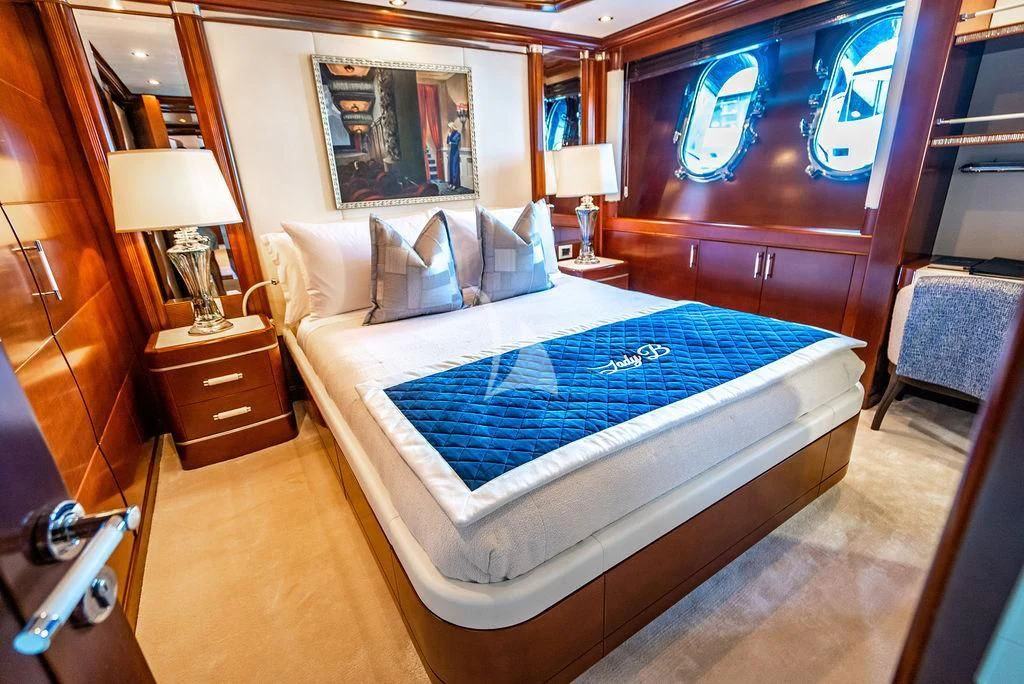 a bed in a room aboard LADY BRAVE Yacht for Sale
