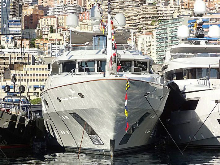 a boat docked in a harbor aboard LADY BRAVE Yacht for Sale