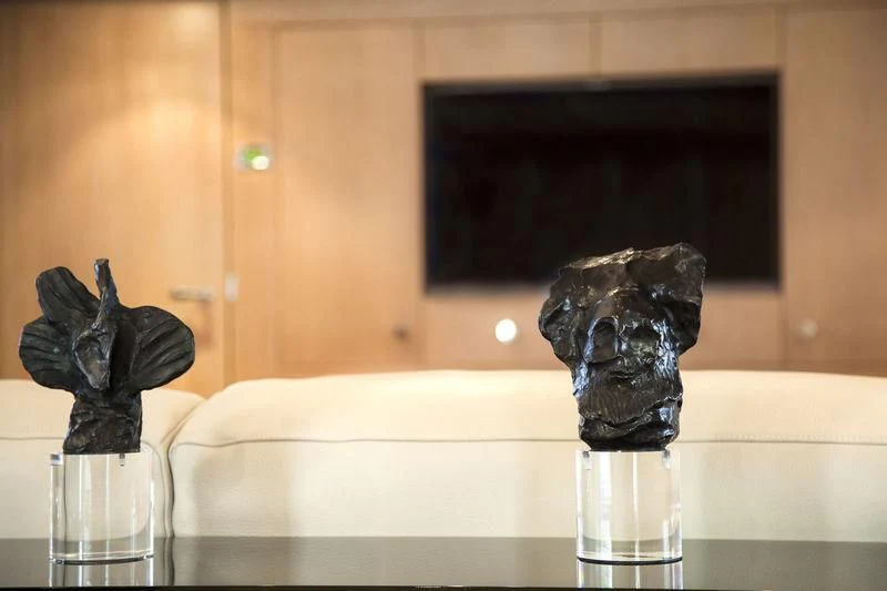 a statue on a table aboard LADY BRAVE Yacht for Sale