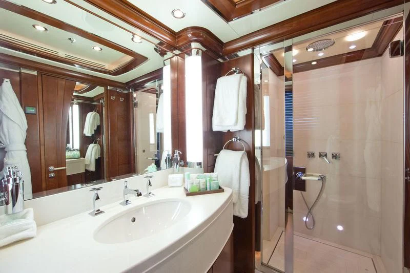 a bathroom with a sink and a shower aboard LADY BRAVE Yacht for Sale