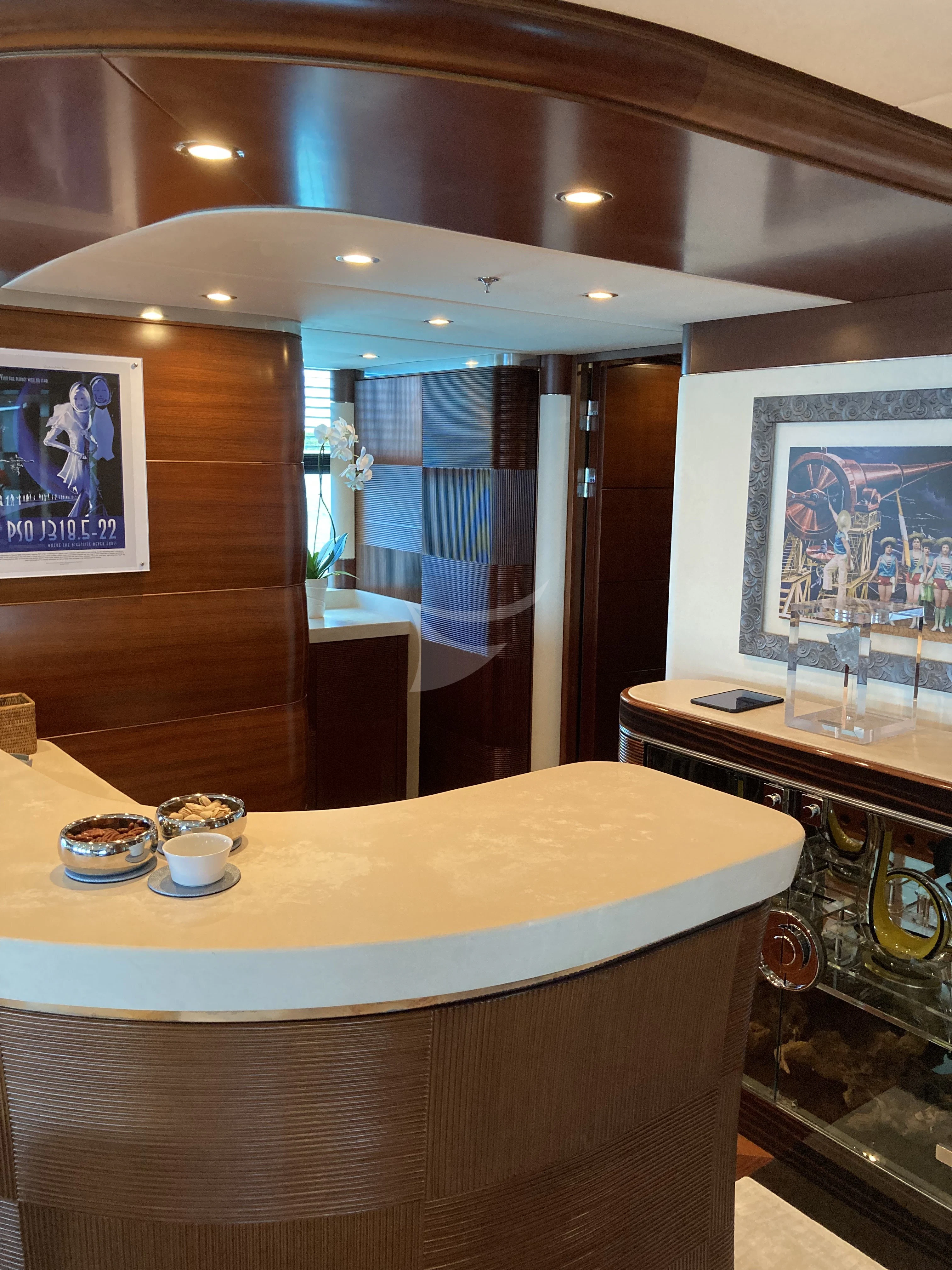 a room with a door and a mirror aboard LADY BRAVE Yacht for Sale