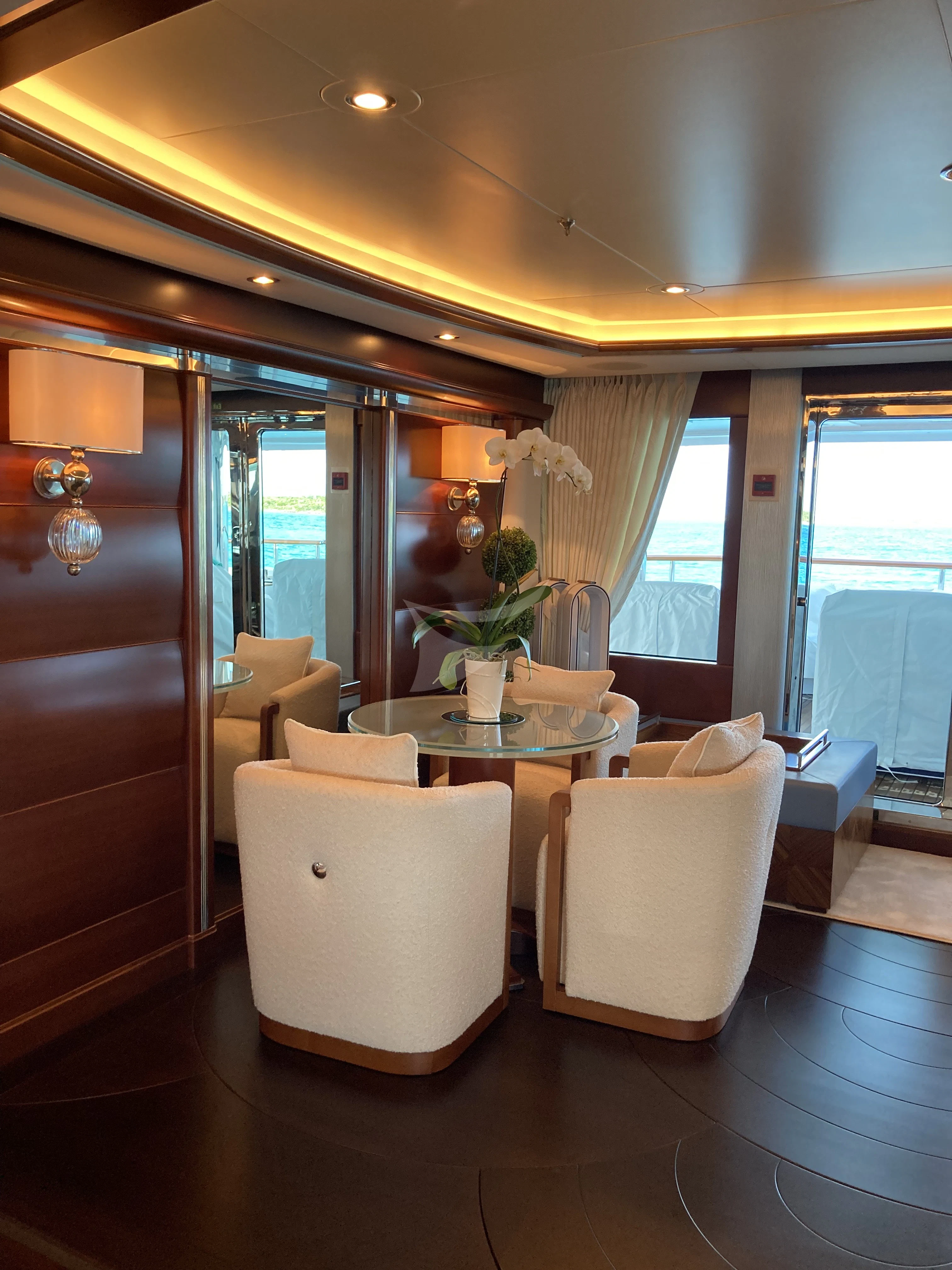 a chair in a room aboard LADY BRAVE Yacht for Sale