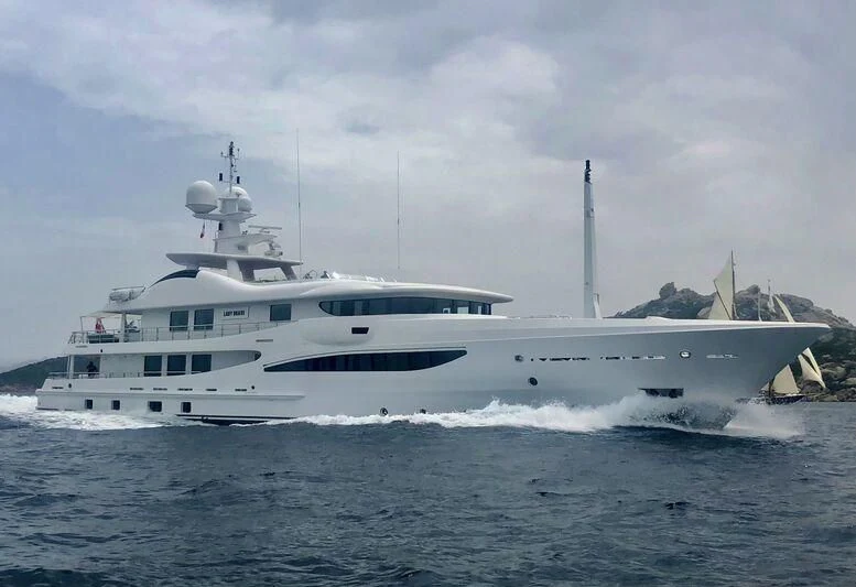 a white yacht on the water aboard LADY BRAVE Yacht for Sale