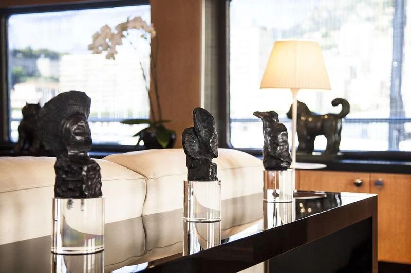 a group of cats sit on a couch aboard LADY BRAVE Yacht for Sale