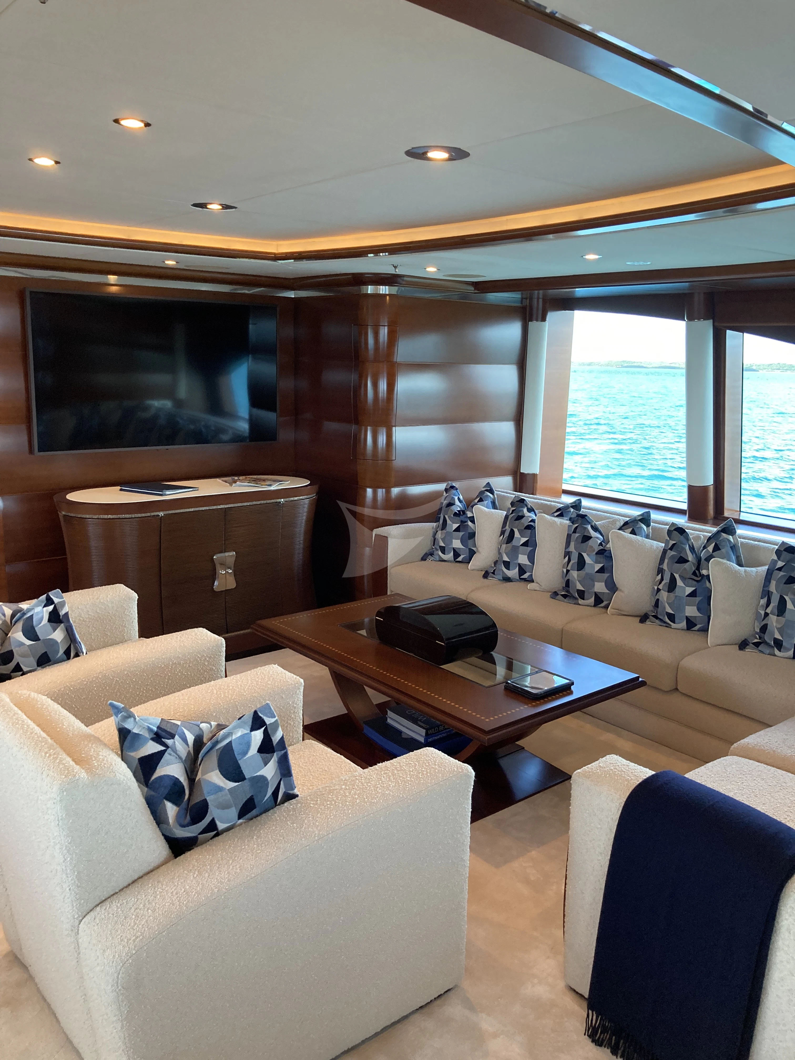 a room with a couch and a door aboard LADY BRAVE Yacht for Sale