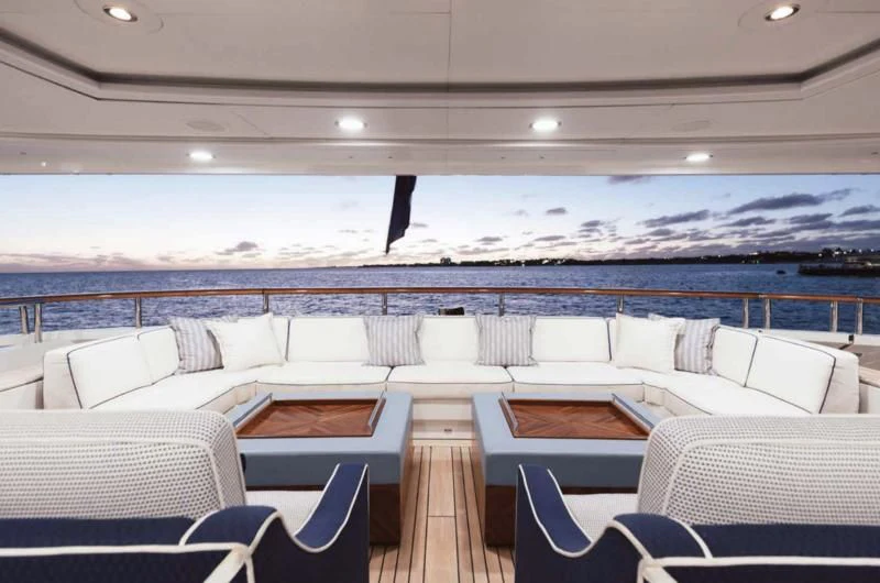 a room with a view of the ocean and the deck aboard LADY BRAVE Yacht for Sale