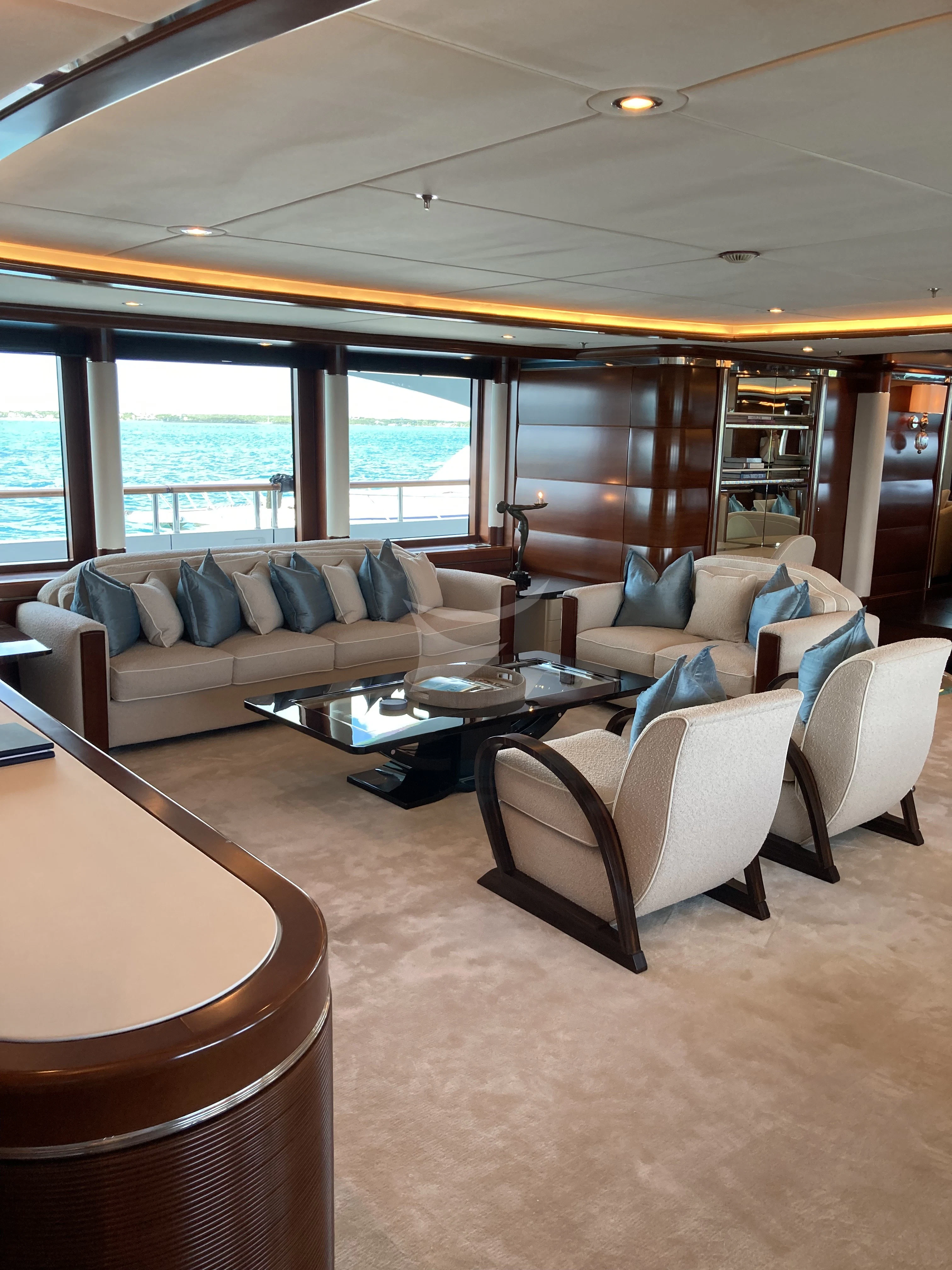 a room with a lamp and a window aboard LADY BRAVE Yacht for Sale