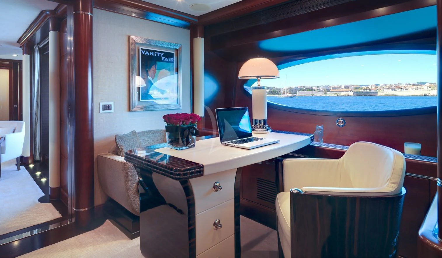 a room with a desk and a window aboard LADY BRAVE Yacht for Sale