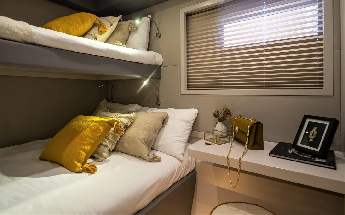 a bed with a mirror and a lamp on it aboard BERING B82 Yacht for Sale