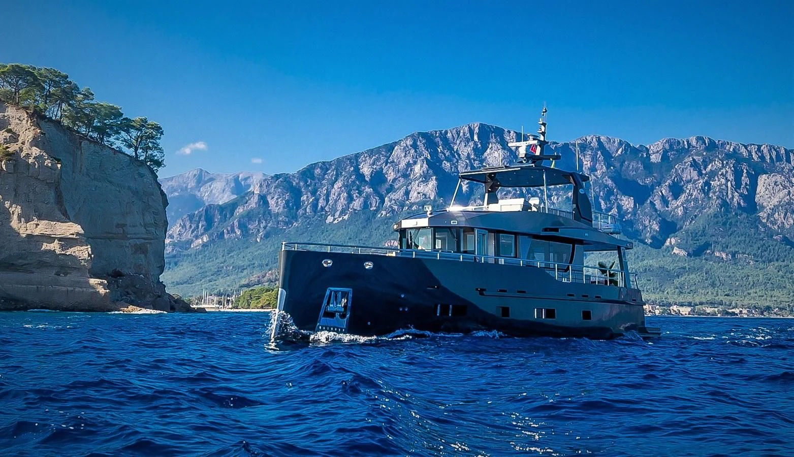 a boat on the water aboard BERING B82 Yacht for Sale