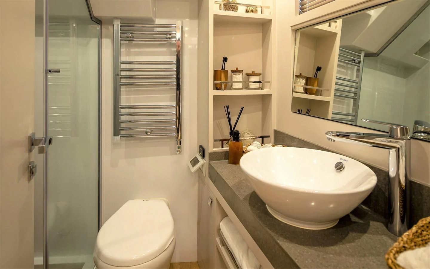 a bathroom with a sink and a shower unit aboard BERING B82 Yacht for Sale