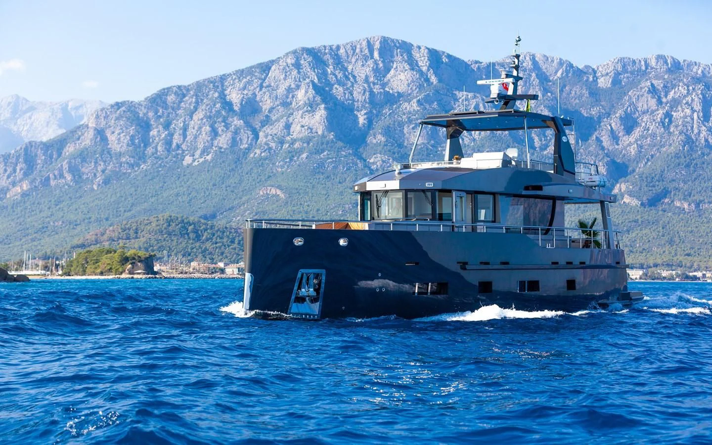 a boat on the water aboard BERING B82 Yacht for Sale