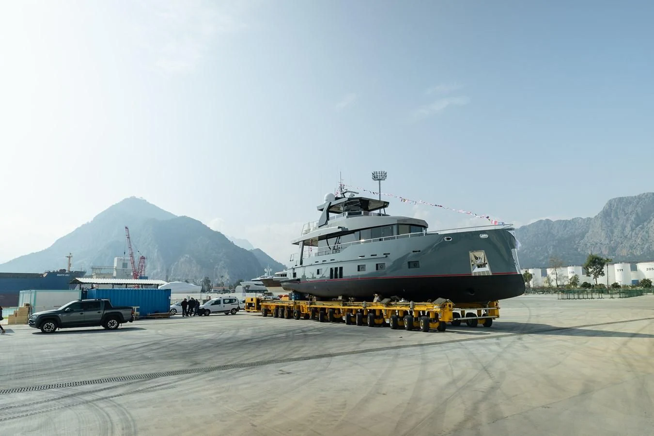 a large boat on a dock aboard BERING B82 Yacht for Sale