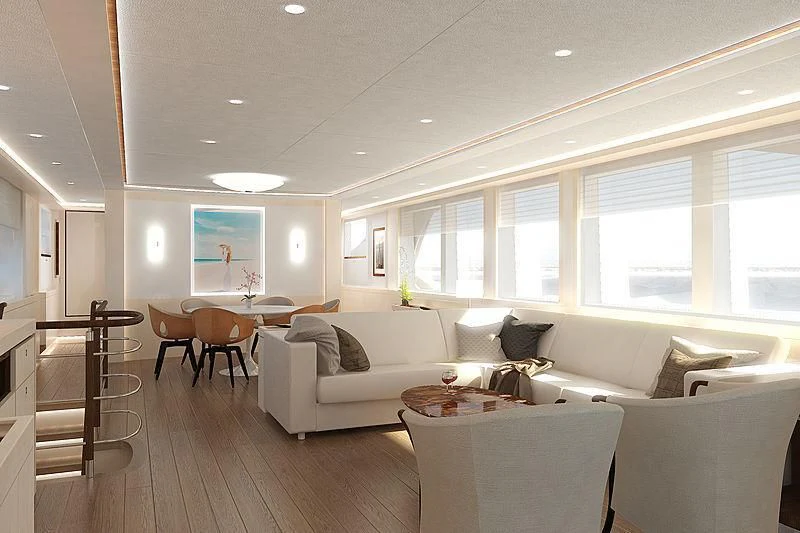 a living room with white couches and a wood table aboard VANADIS Yacht for Sale