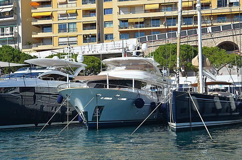 boats docked in a harbor aboard VANADIS Yacht for Sale