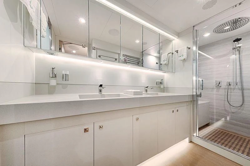 a bathroom with a glass shower aboard VANADIS Yacht for Sale