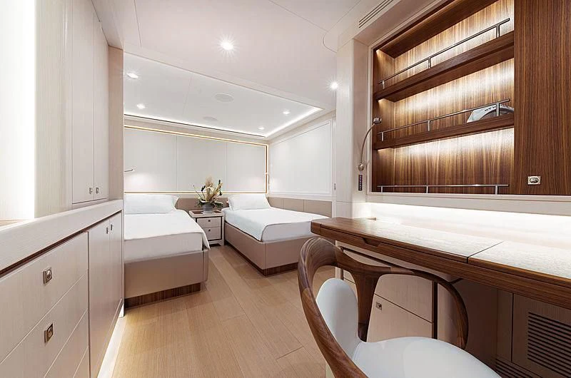a room with a bed and a couch aboard VANADIS Yacht for Sale