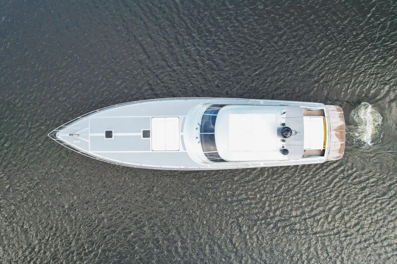 a white rectangular object on a black surface aboard ALCHEMY Yacht for Sale