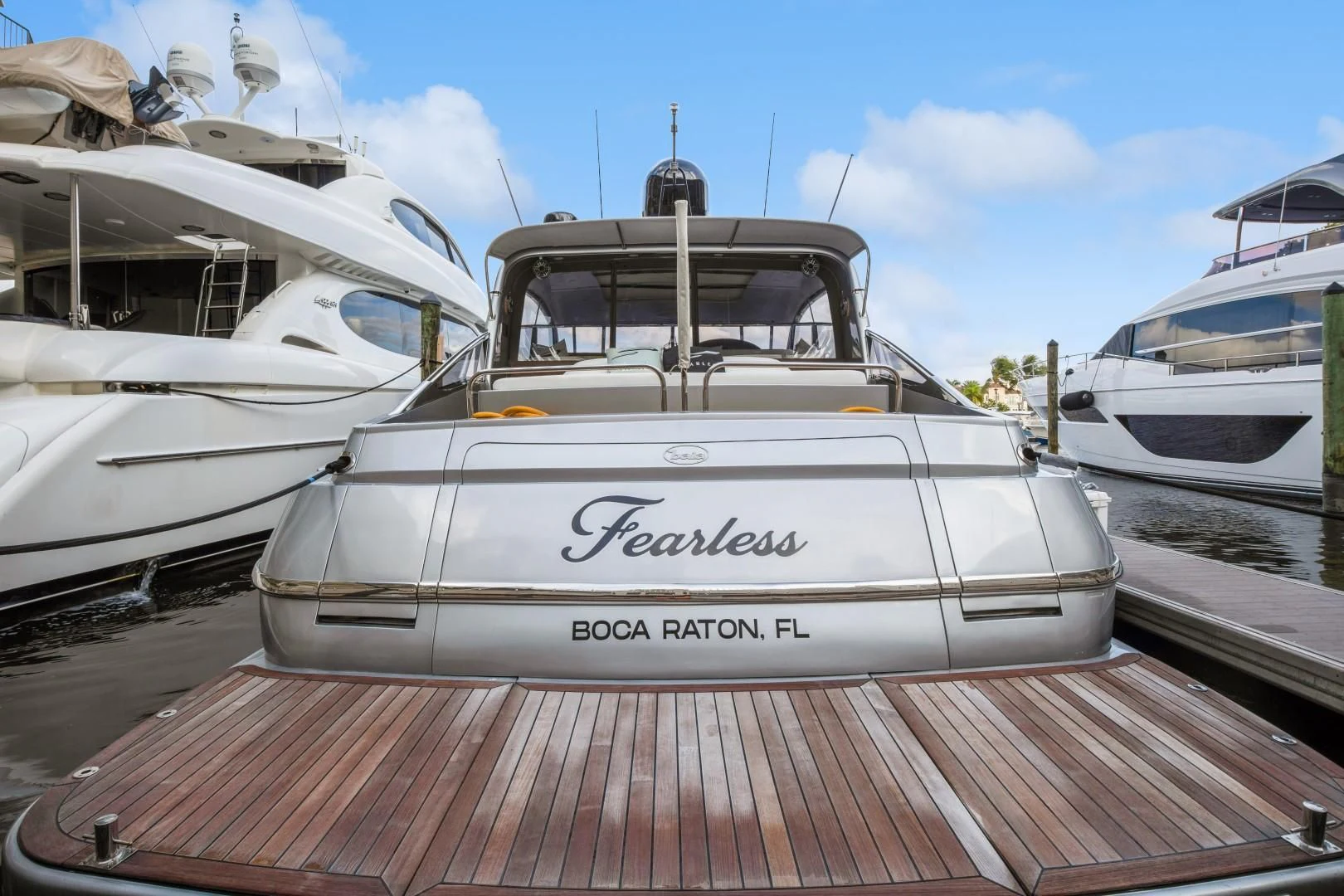 a boat parked on a dock aboard ALCHEMY Yacht for Sale