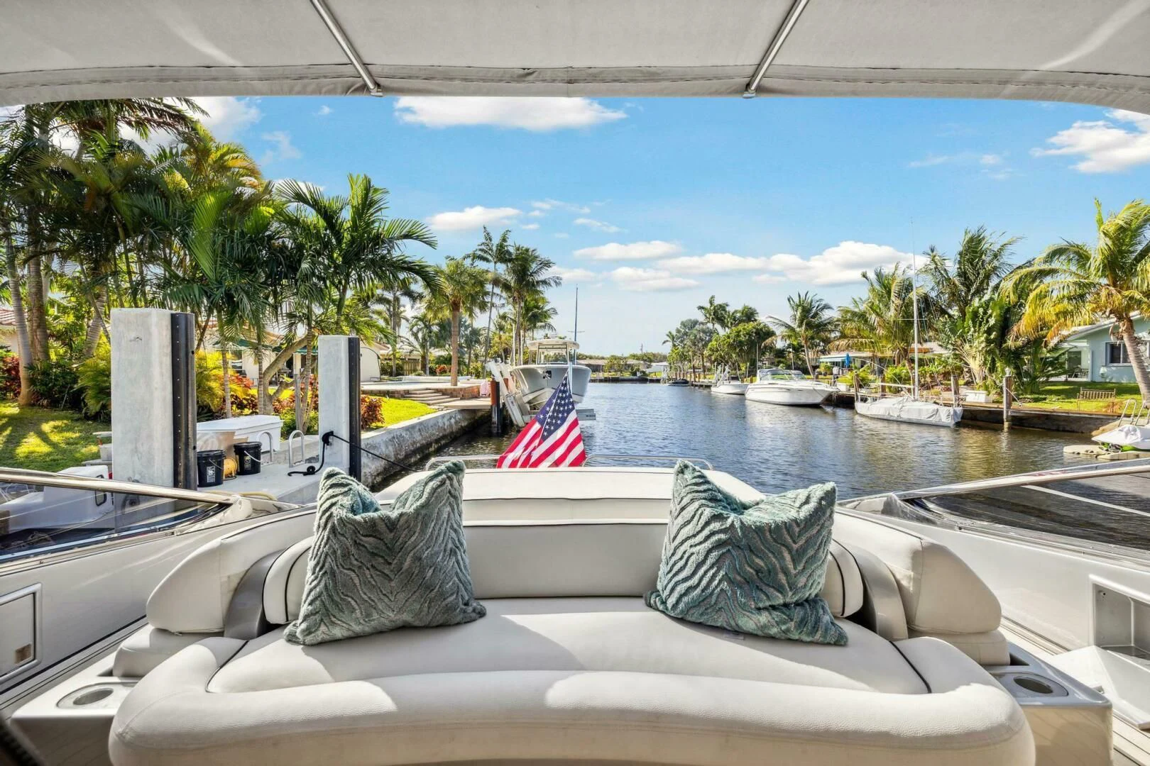 a boat with a flag on the front aboard ALCHEMY Yacht for Sale