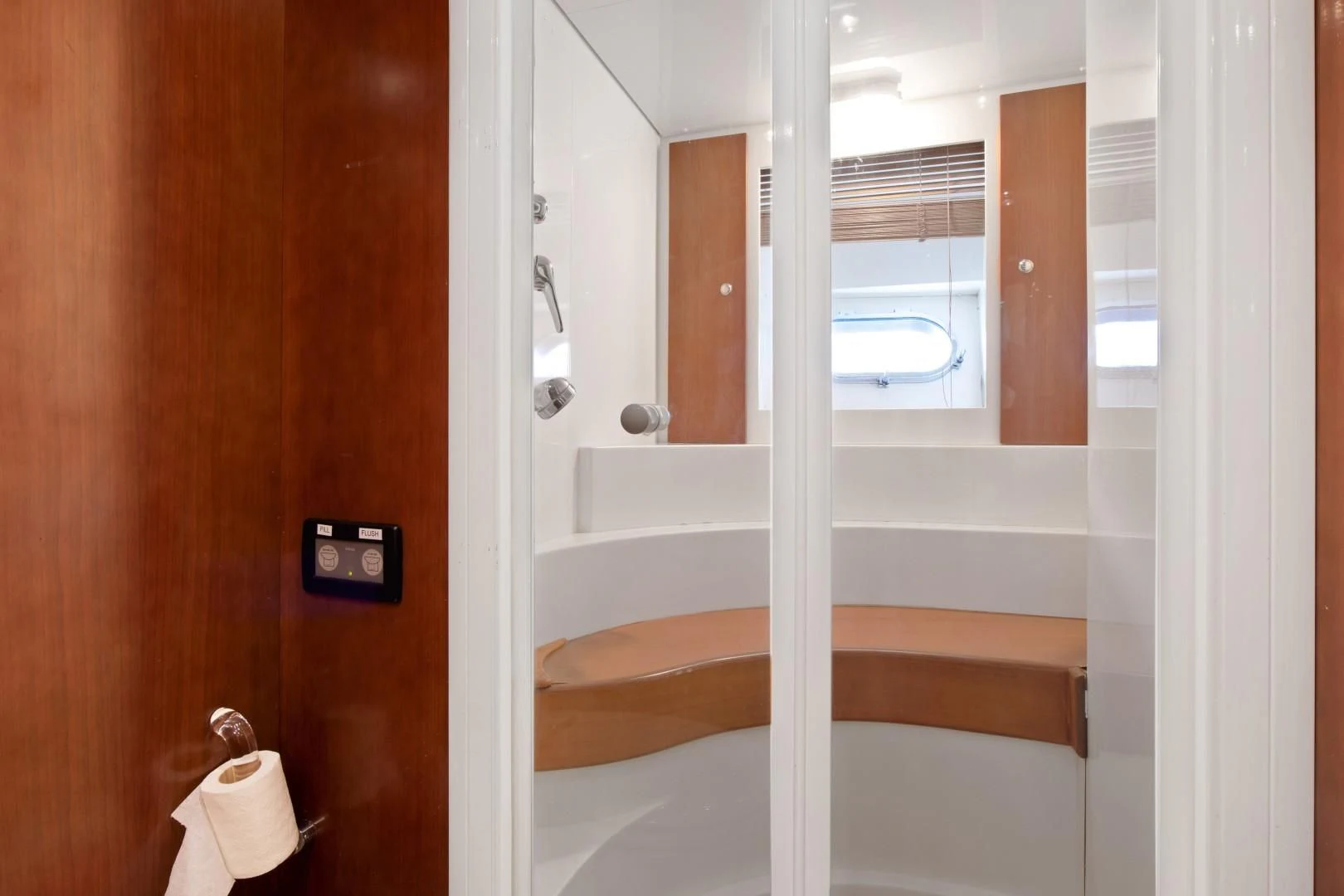 a white door with a rectangular window aboard ALCHEMY Yacht for Sale