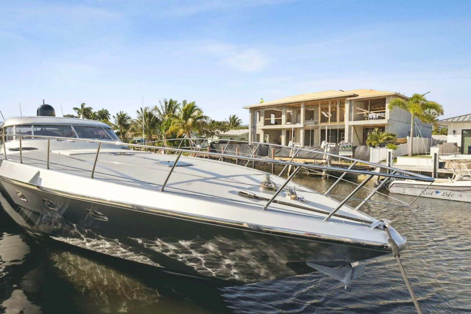 a boat docked at a pier aboard ALCHEMY Yacht for Sale