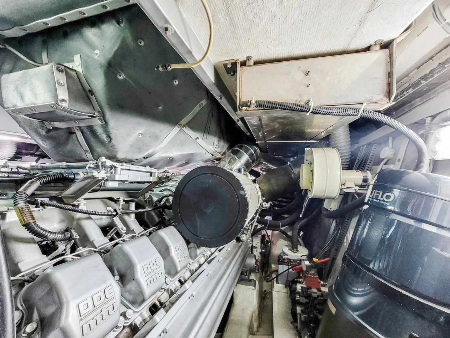 a car engine with a car hood aboard ALCHEMY Yacht for Sale