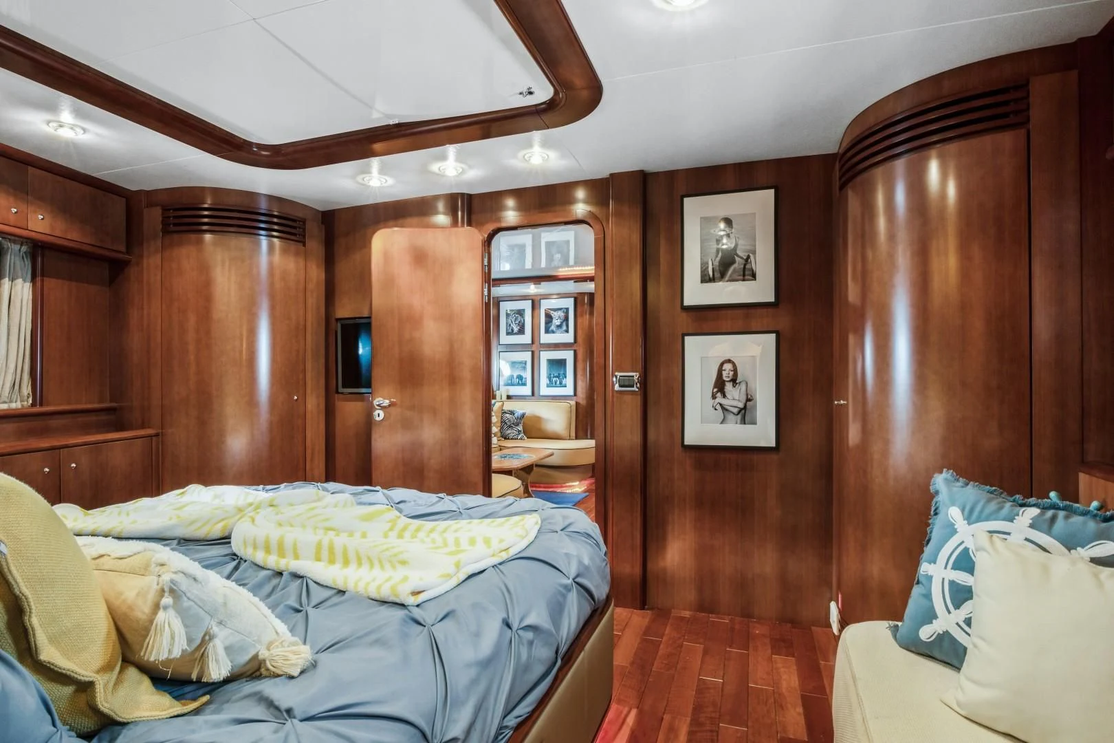 a bedroom with a wood door aboard ALCHEMY Yacht for Sale