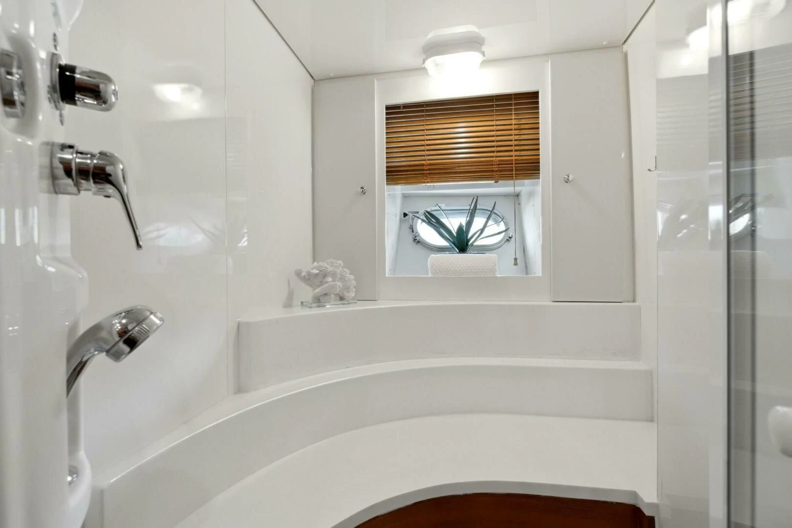 a bathroom with a sink and a mirror aboard ALCHEMY Yacht for Sale