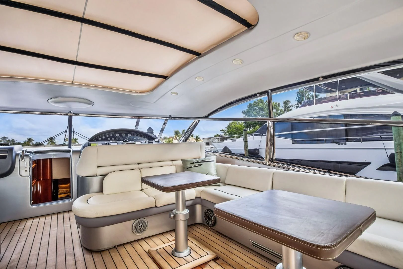 a boat with a couch aboard ALCHEMY Yacht for Sale