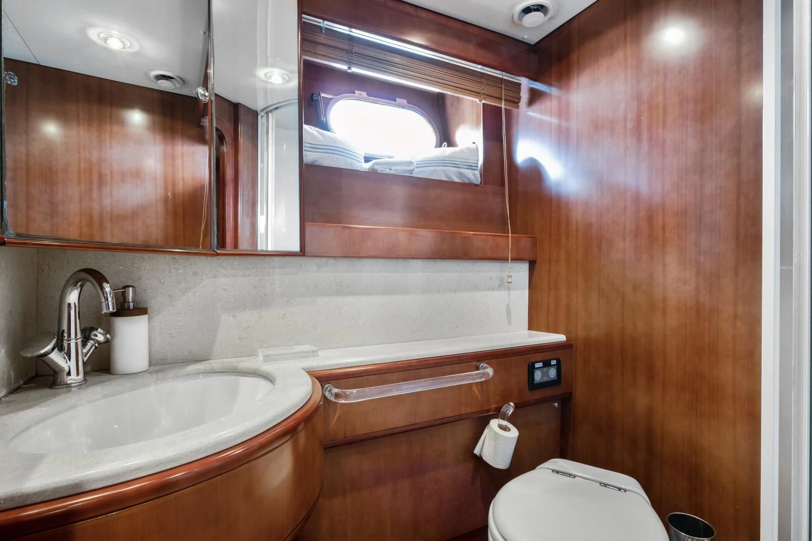 a bathroom with a sink and a toilet aboard ALCHEMY Yacht for Sale