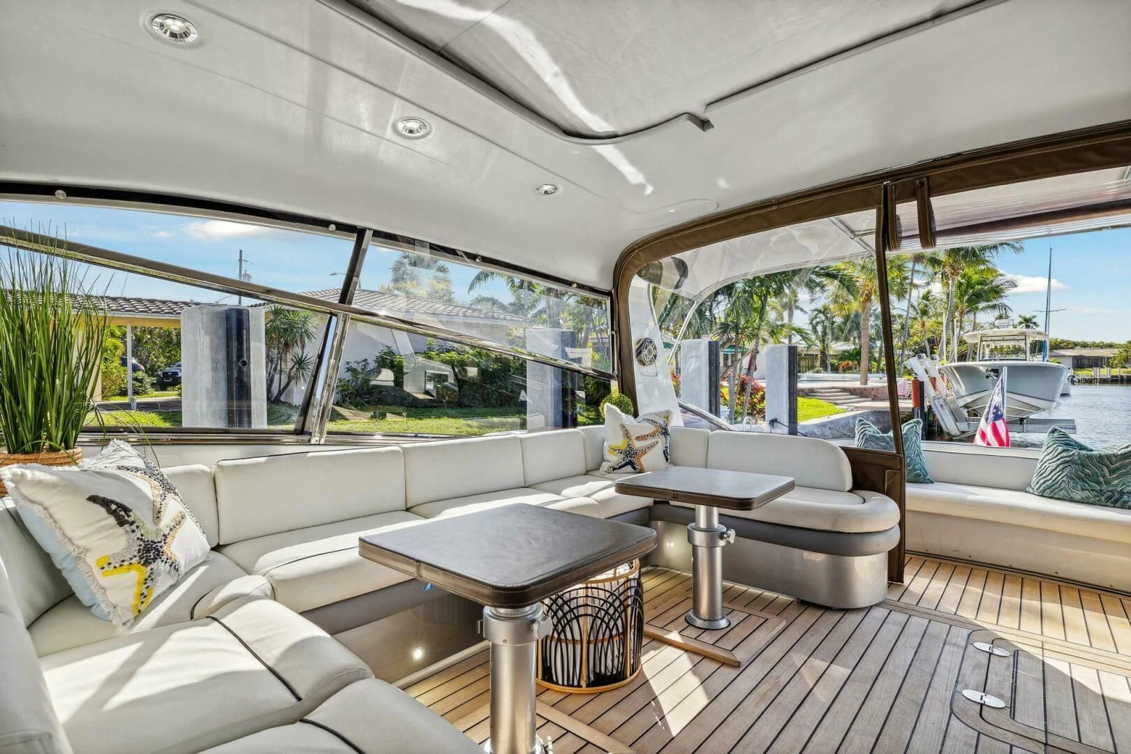 a room with a couch and a table and chairs aboard ALCHEMY Yacht for Sale