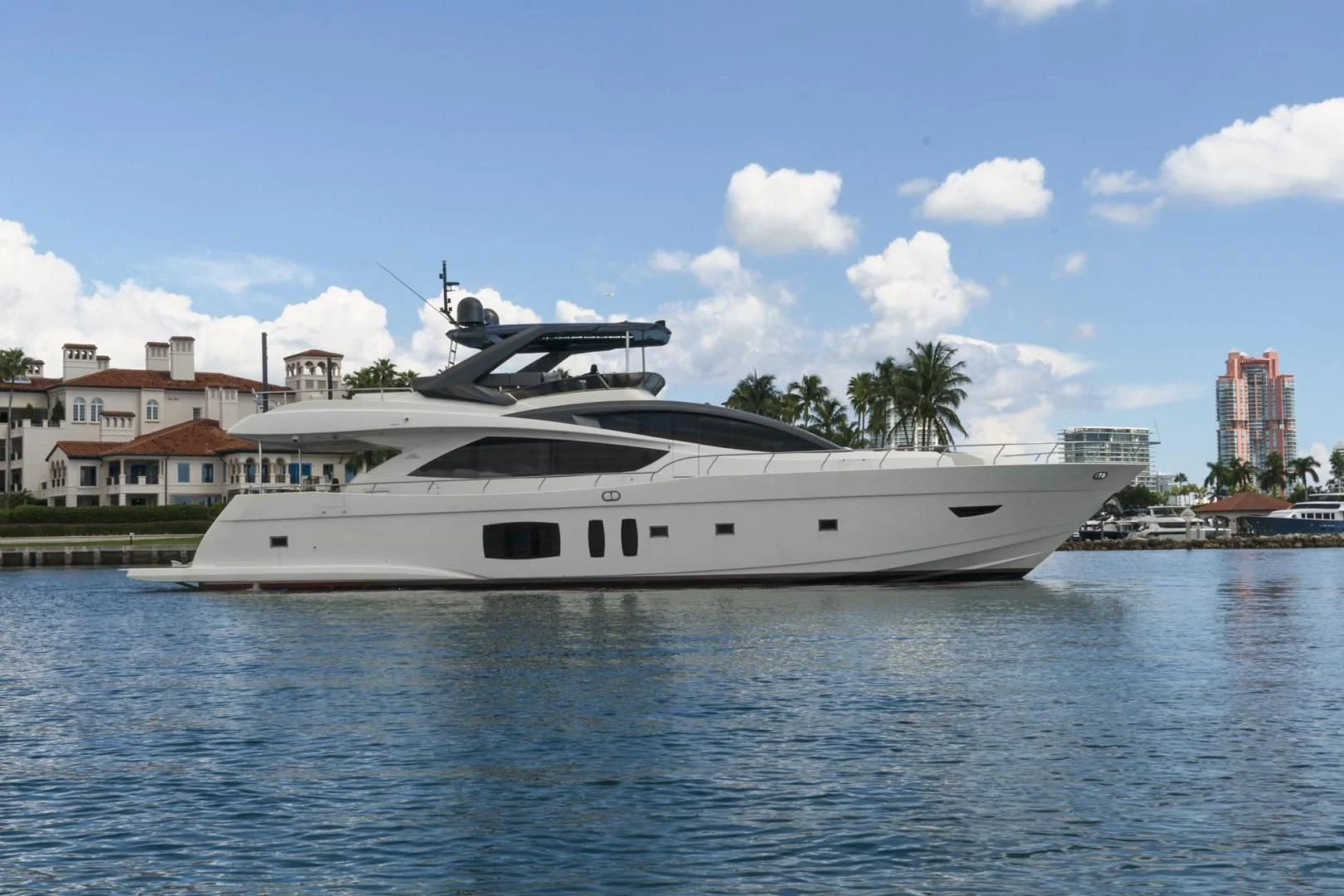 a white yacht in the water aboard EL PATRON Yacht for Sale