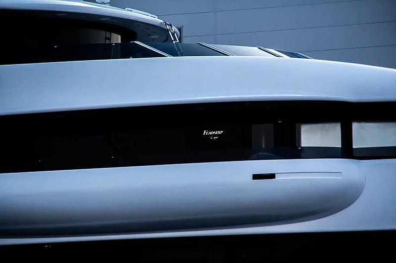 a close-up of a white car aboard SYMPHONY Yacht for Sale