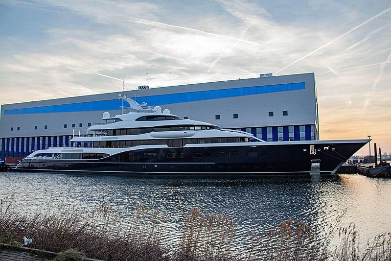 a large cruise ship docked aboard SYMPHONY Yacht for Sale