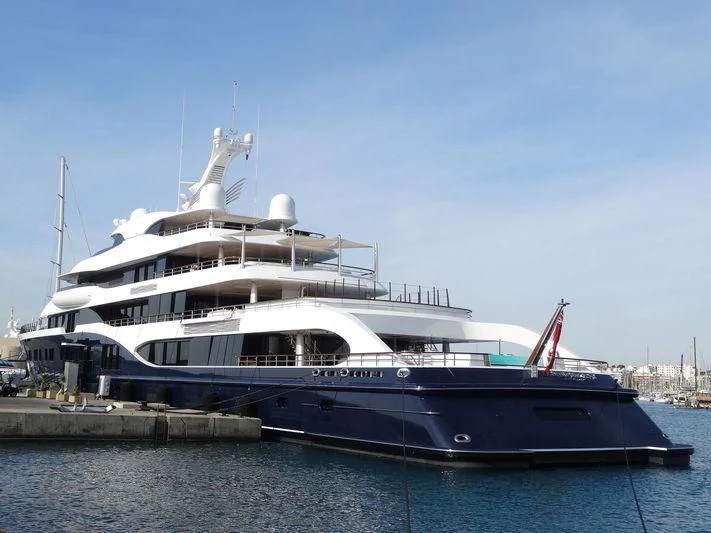 a large white boat on the water aboard SYMPHONY Yacht for Sale