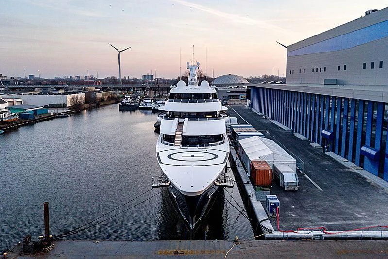a boat docked at a pier aboard SYMPHONY Yacht for Sale